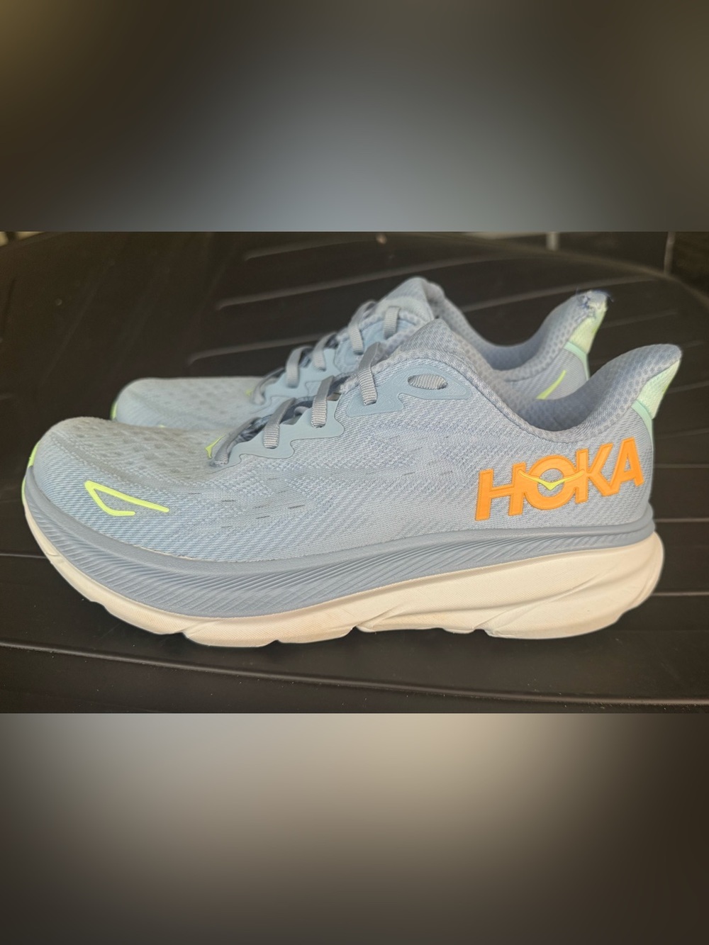 Hoka Pale Blue Sneakers with Orange Logo